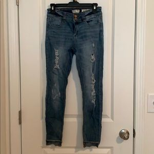 Distressed blue jeans